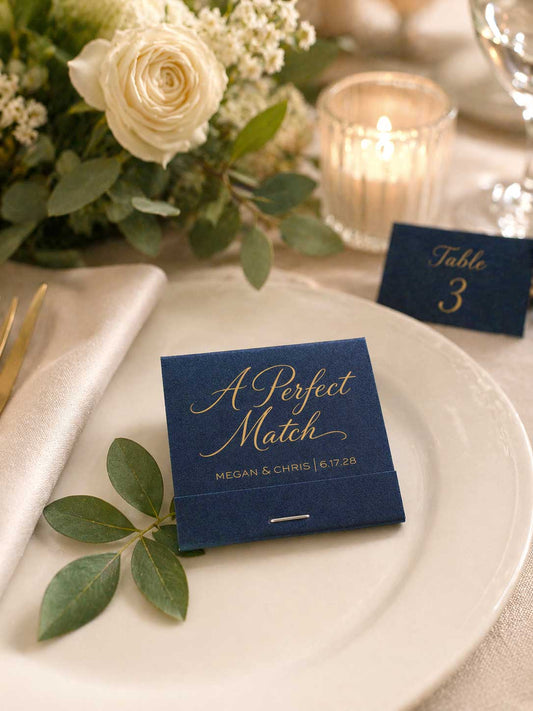 Navy blue card with 'A Perfect Match' text on a white plate with greenery