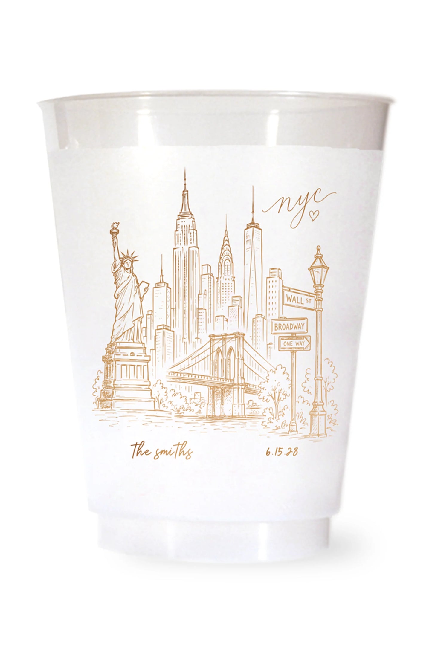 white shatterproof plastic cup on a white background. the cup is printed with a hand drawn illustration of the new york city sklyine with the bride and grooms names and wedding date in gold ink.