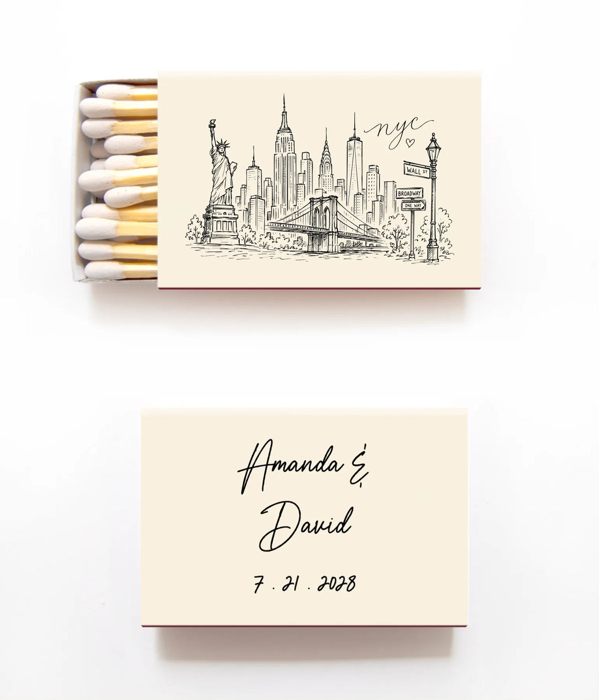 Personalized matchbox set on a white background, featuring a top matchbox with a New York City skyline illustration and the text 'Amanda & David 7.21.