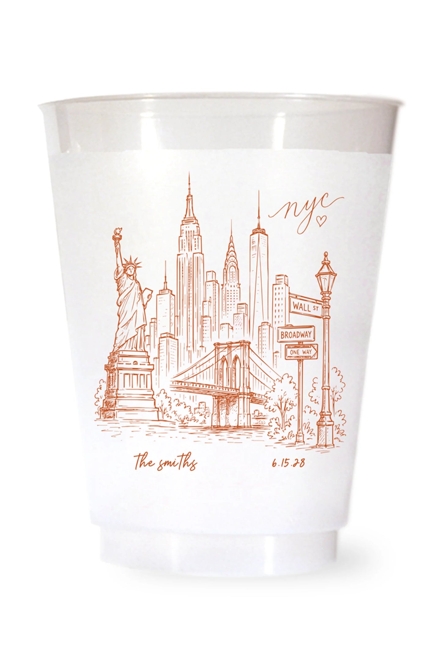 white shatterproof plastic cup on a white background. the cup is printed with a hand drawn illustration of the new york city sklyine with the bride and grooms names and wedding date in terracotta ink.