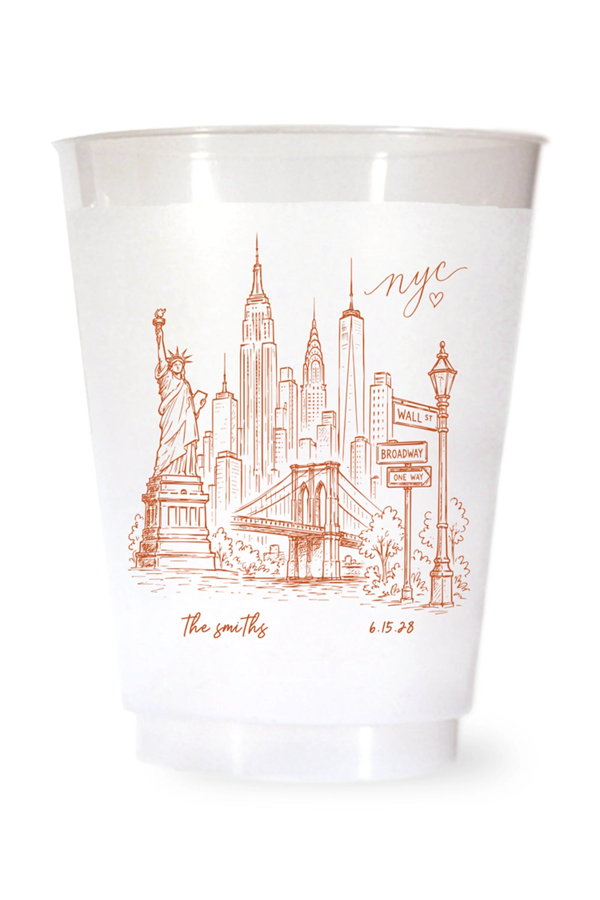 white shatterproof plastic cup on a white background. the cup is printed with a hand drawn illustration of the new york city sklyine with the bride and grooms names and wedding date in terracotta ink.