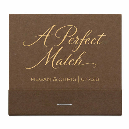 Brown matchbox with 'A Perfect Match' and personalized text on a white background