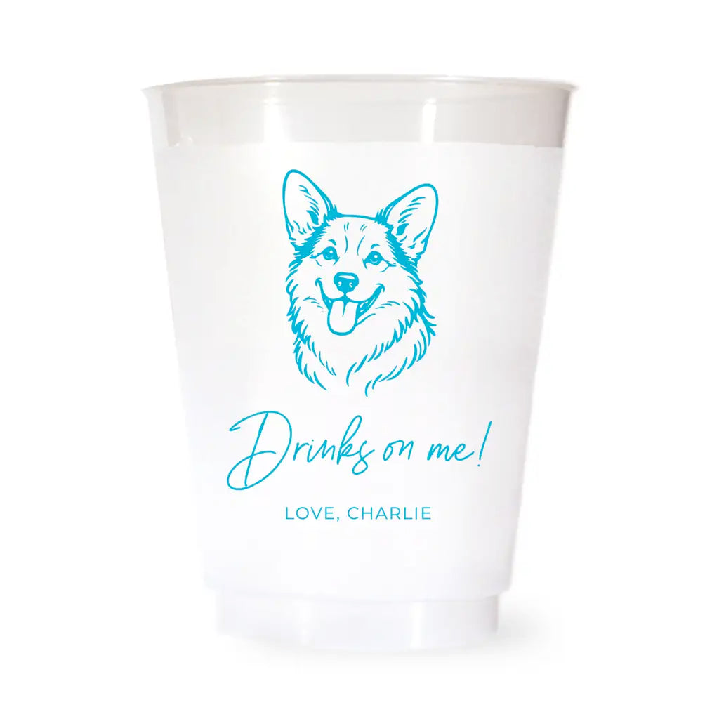 White cup with blue Corgi dog illustration and text on a white background