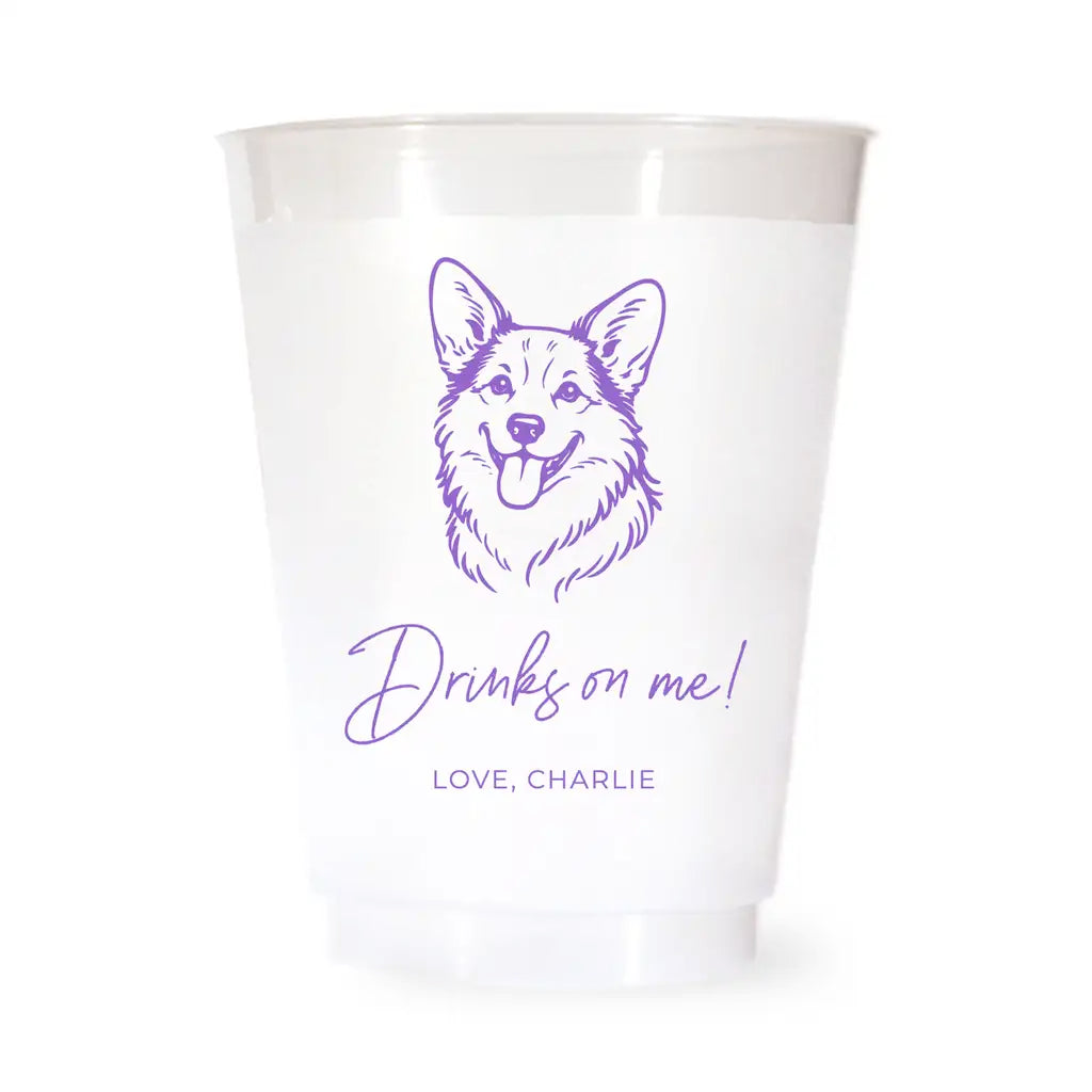 White cup with purple corgi illustration and text on a white background