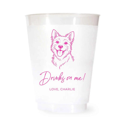 White cup with a pink terrier dog illustration and drinks on me love charlie text on a white background