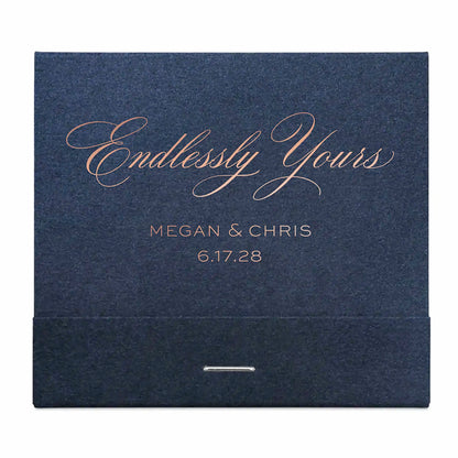 Navy blue matchbook with 'Endlessly Yours' and rose gold personalized text on a white background