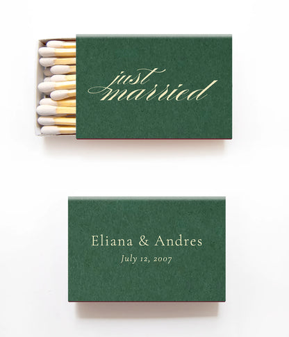 green matchboxes on a white background that say just married in ivory and also have the bride and grooms names and wedding date. 